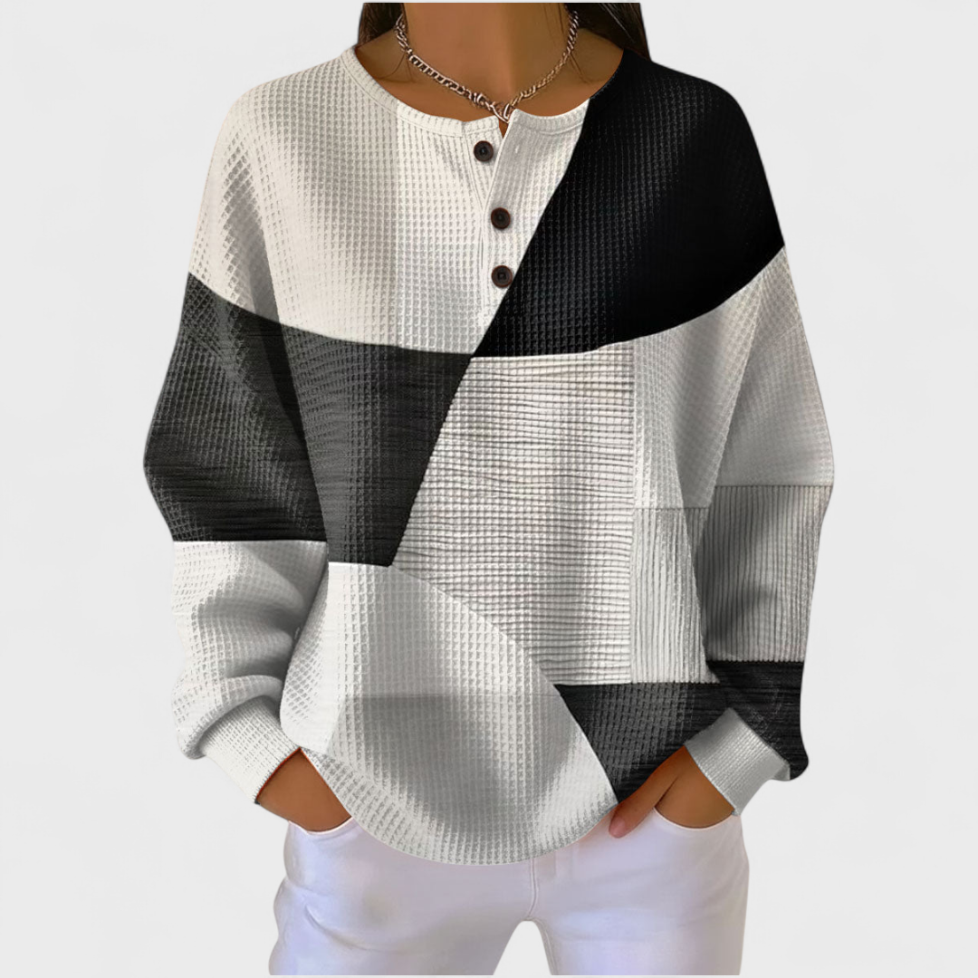 Ella | Pull noir et blanc avec color-block