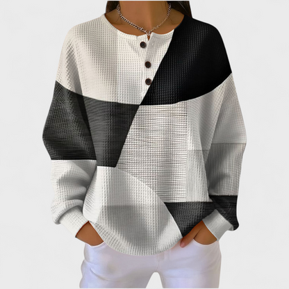 Ella | Pull noir et blanc avec color-block