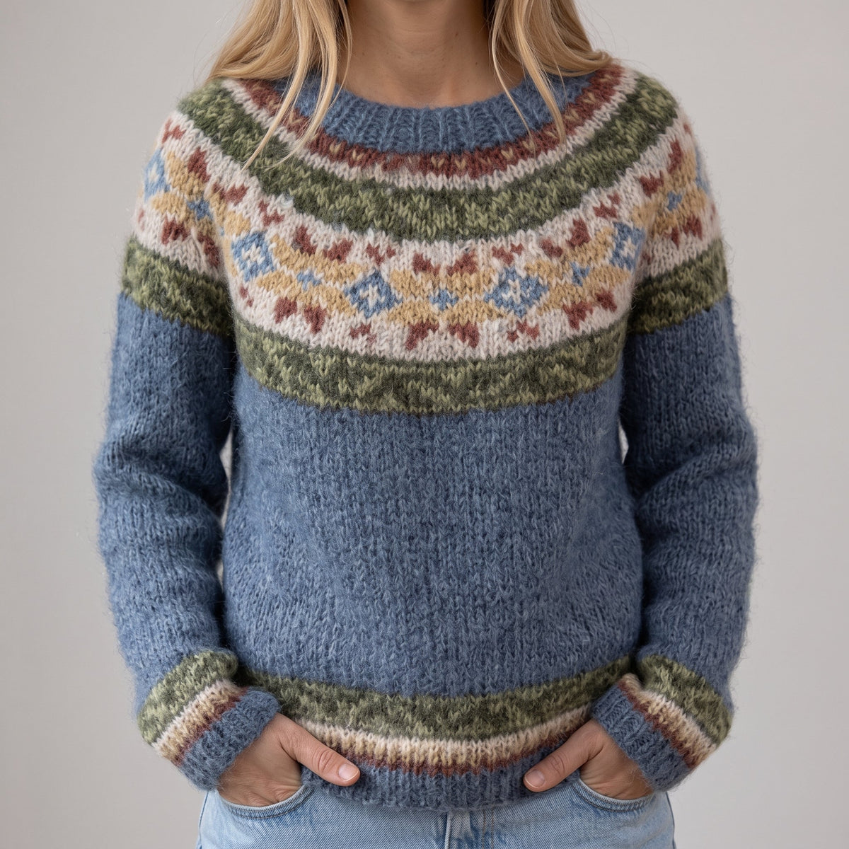 Das Katri | Pull rétro bleu avec motif floral